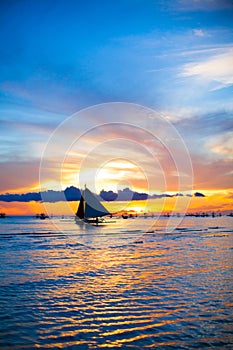 Sailing boat in awesome sunset in Boracay island