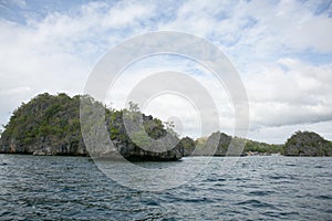 Sailing on a boat in the bay of coron, Philippine islands