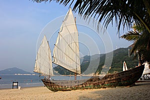 Sailing boat on the beach.