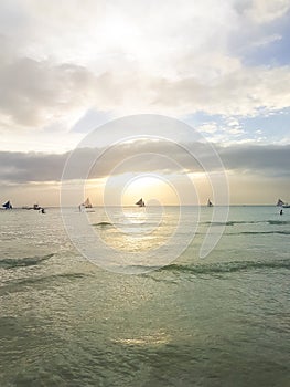 Sailing boat at beautiful colorful sunset Boracay, Philippines