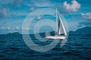 Sailing boat in the blue ocean of La Digue Seychelles neer Mahe and Praslin