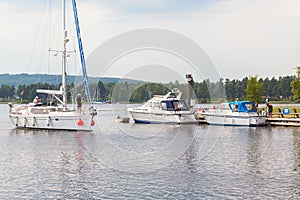 Sailing boat in the channel