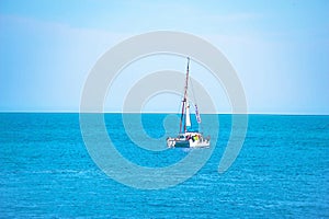 Sailing boat flowing on the open sea, watercolor painted