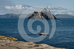 sailing boat in front of little skellig