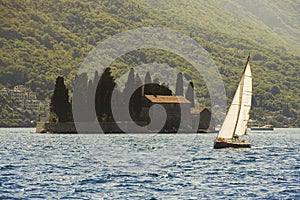 Sailing boat and Gospa od Skrpjela photo