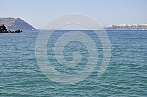 Sailing boat journay on the aegean sea in the Santorini Caldera