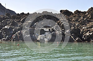 Sailing boat journay for fishing in the Santorini Caldera