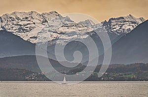 Sailing boat on Lake Thun, Spiez, Bernese Oberland, Switzerland photo