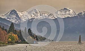 Sailing boat on Lake Thun, Spiez, Bernese Oberland, Switzerland photo