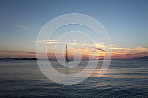 Sailing Boat. Mikonos beautiful sunset light. Greece