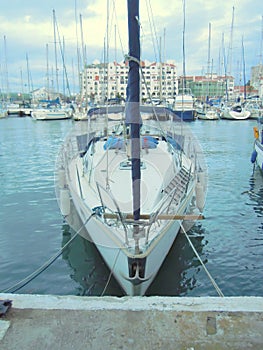 Sailing boat moored in yacht marina