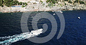 Sailing boat moving past the camera. Boat and yachts in the mediterranean sea.