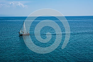 Sailing boat at an open sea