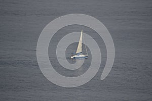 Sailing boat sailing through the Cantabrian Sea photo