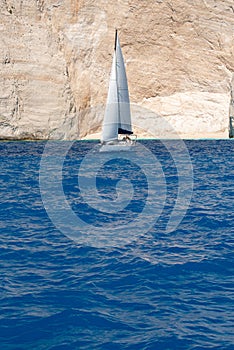 Sailing boat in summer time on Ionian sea near Zakintos beach