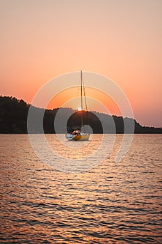 Sailing boat sunset landscape Aegean sea travel in Turkey yachting transport