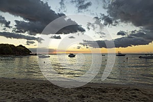 Sailing boat during sunset on the public beach of Albion,Mauritius.