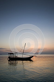 Sailing boat at sunset in zanzibar africa