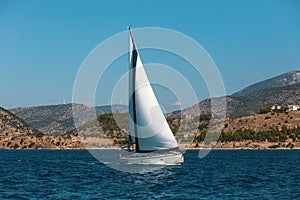 Sailing boat yacht on blue water Sea. Travel.