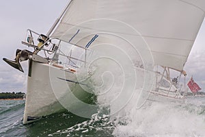 Sailing Boat Yacht in Rough Sea Waves