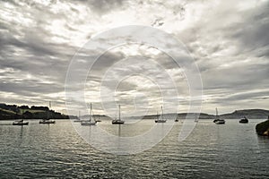 Sailing boats anchor in Deborah Bay near Port Chalmers and Dunedin