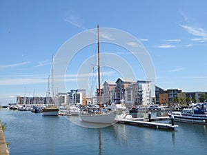 Sailing boats berthed in marina