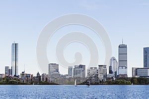 Sailing boats on a Charles River with view of Boston skyscrapers