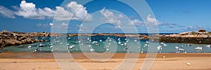 Sailing boats on Coz-Pors beach in Tregastel, CÃÂ´tes d`Armor, Brittany France