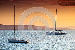 Sailing boats on Lake Balaton at sunset