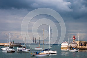 Sailing boats and lighthouse at Dun Laoghaire, Dublin, Ireland