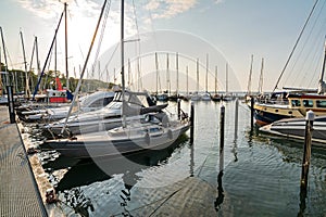 Sailing boats in a marina (Langballigau) during sunset at the Baltic Sea in Northern Germany