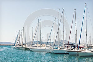 Sailing boats moored in the harbor