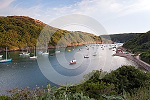 Sailing boats moored in the scenic harbor of Solva