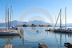 Sailing boats parking in Chiemsee lake pier