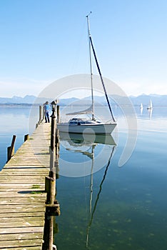 Sailing boats parking in Chiemsee lake pier