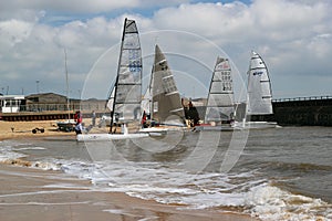 Sailing boats preparing to race.