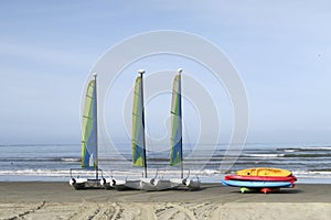 Sailing boats on sandy beach