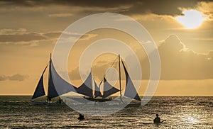 Sailing boats on the sea at the sunset at Boracay island