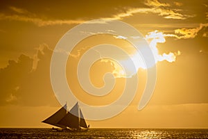 Sailing boats on the sea at the sunset at Boracay island