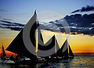 Sailing boats at sunset