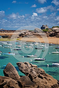 Sailing Boats and transparent water on Coz-Pors beach in Tregastel CÃÂ´tes d`Armor, Brittany, France