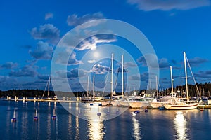 Sailing boats and yachts in marina at night. Nynashamn. Sweden.