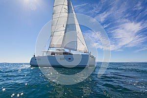Sailing catamaran sail the Aegean sea