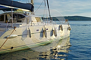 Sailing catamaran at sunset