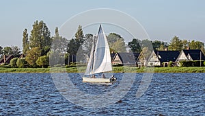 Sailing on the IJsselmeer near Oudega in Friesland the Netherlands