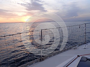 Sailing at the Mediterranean sunset photo