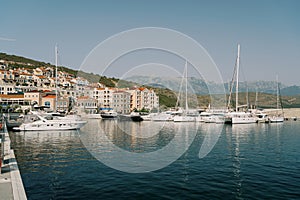 Sailing and motor yachts are moored off the coast of Lustica Bay. Montenegro photo