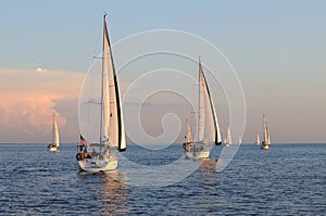 Sailing off into the sunset photo