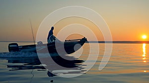 Sailing process of a fishing speedboat with two men onboard