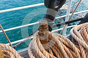 Sailing ropes on the deck of a sailing ship close up, selective focus